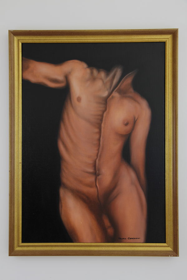 A framed painting of a bent human torso against a dark background.