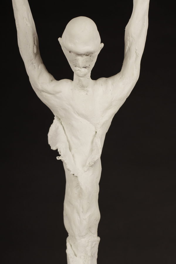 The Monk by Valeriu Cazacevschi. Close view of the face, chest and two raised arms.